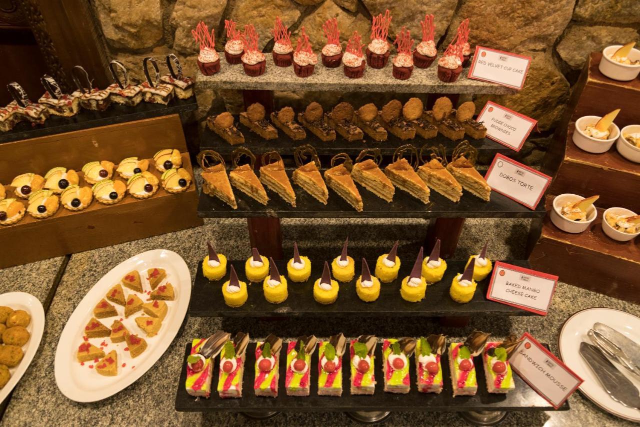 Heritage Madurai Eksteriør bilde A selection of desserts